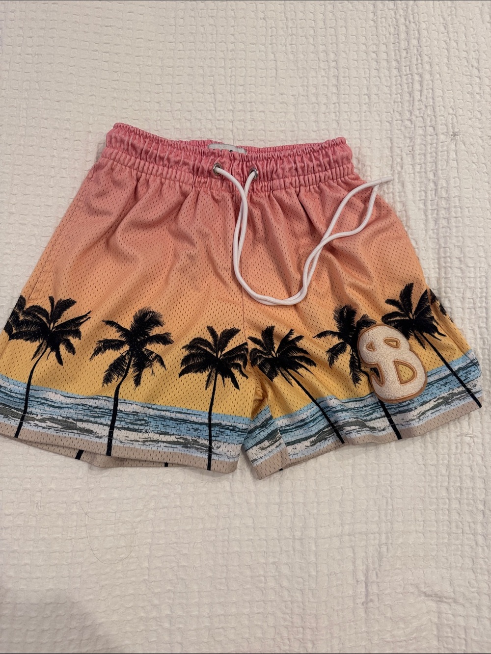 Bucket squad palm print shorts